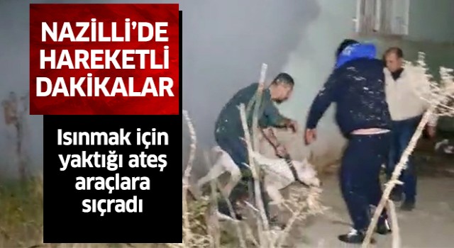 Isınmak için yaktığı ateş araçlara sıçradı