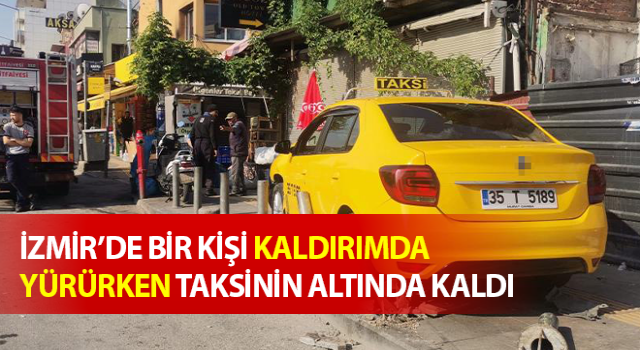 Kaldırımda yürürken taksinin altında kaldı