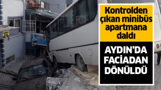 Kontrolden çıkan minibüs apartmana daldı